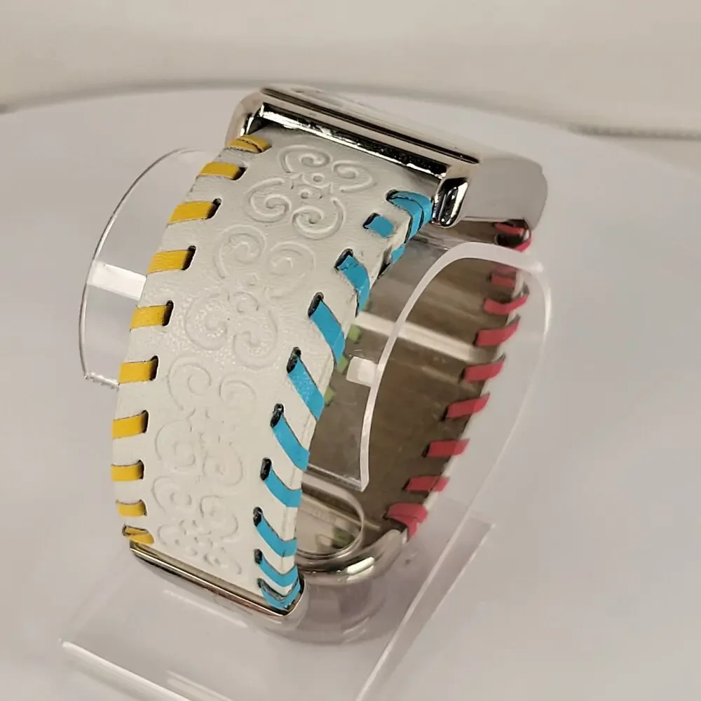 Silver Quartz Watch with Embossed Cuff White Leather Strap and Multicolor Design